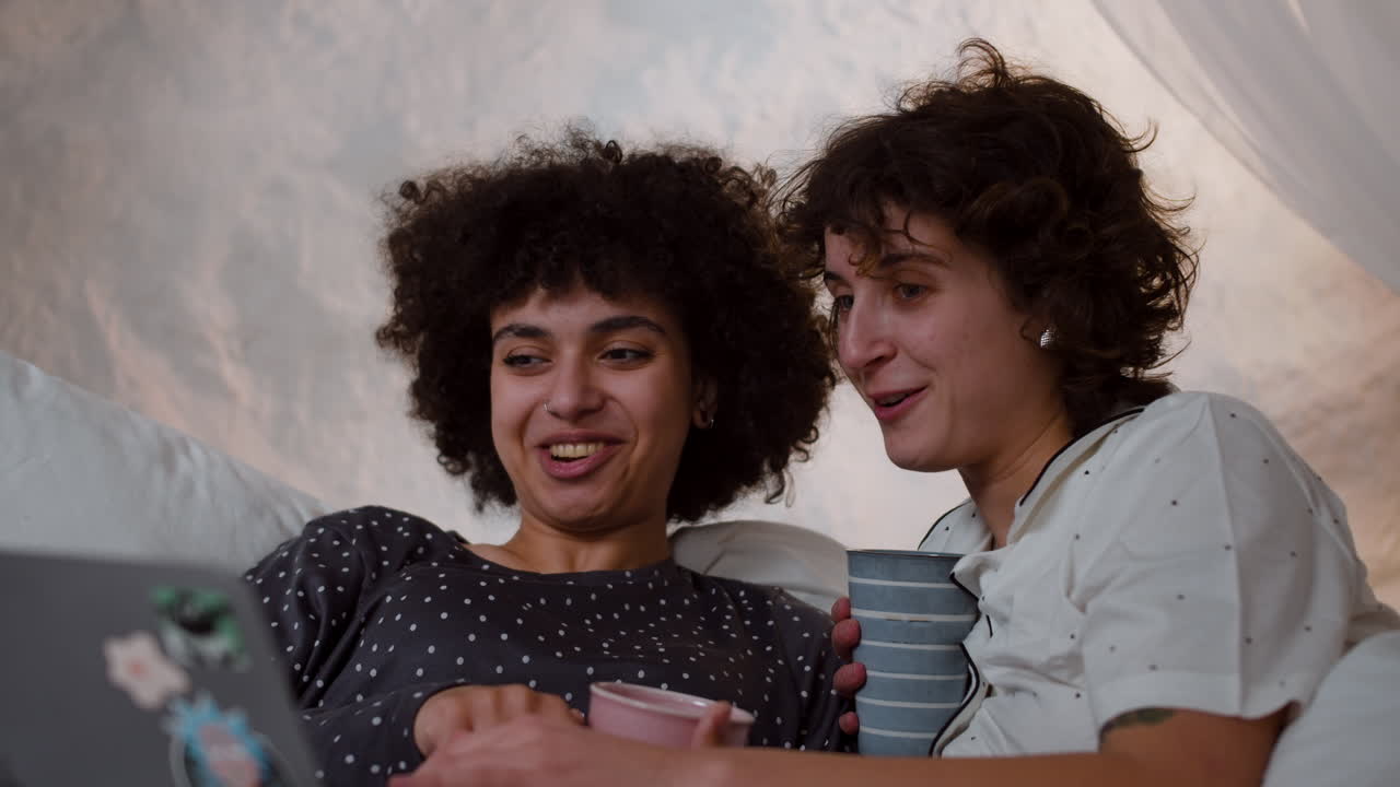 Couple watching movie on laptop