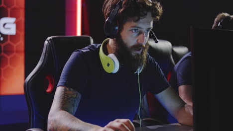 gaming team losing at tournament medium shot of a team losing at a gaming tournament