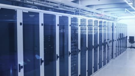 computer servers in a server room with glowing lights