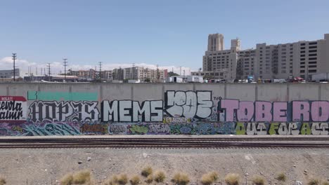 graffiti and train tracks in the city