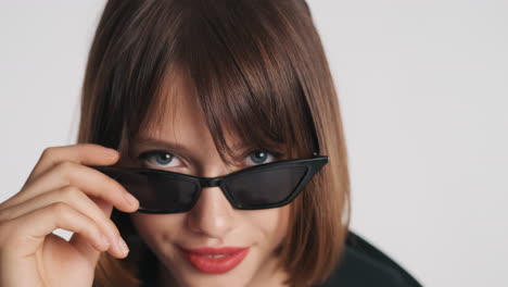 young woman with sunglasses and glamorous look