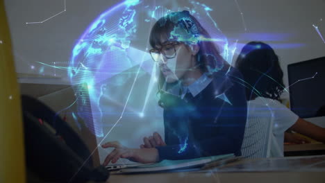 woman typing on laptop in tech office, showcasing holographic globe and network lines