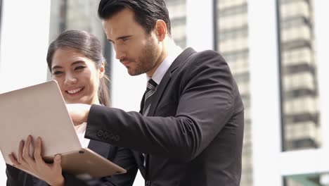 businessman and businesswoman talking discuss project together. concept of project management, business meeting, strategy and performance.