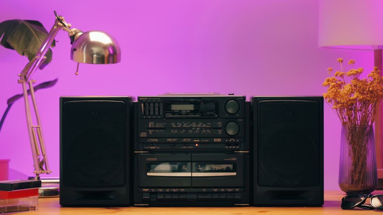 Retro radio tape recorder, audio cassette close-up. Listening to music, old radio boom box player, macro of vintage music listening. . High quality 4k footage