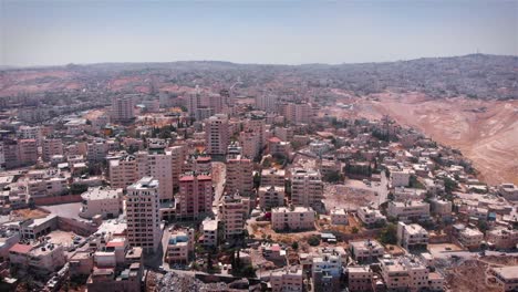 aerial view of a densely populated city on a hillside