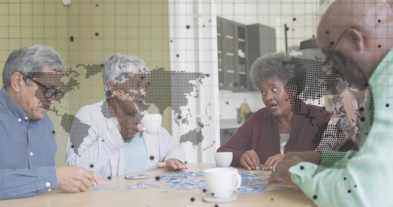 Inclinati in avanti esaminando i pezzi, quattro amici che compongono un puzzle con tazze di caffè per il benessere.