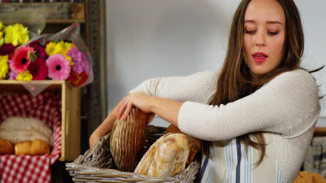 female staff working at bakery section