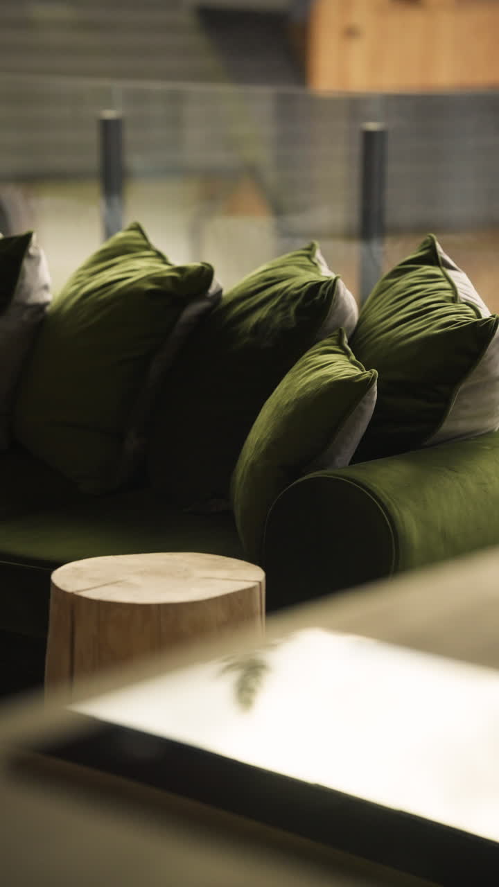 Green Velvet Sofa With Huge Cushions In A Modern Home Interior. Selective Focus Shot
