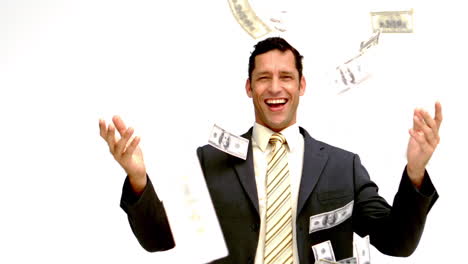 businessman joyfully throwing his money