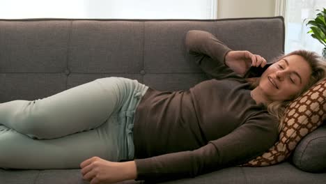 gorgeous young woman talking on the phone