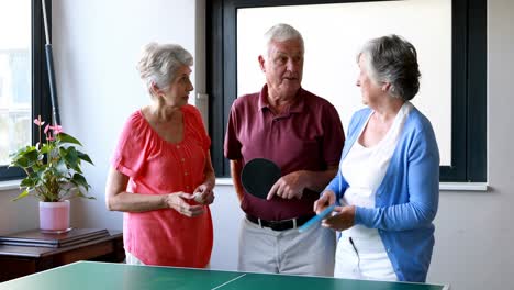 Senior-citizen-standing-interacting-with-each-other
