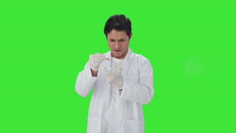 Psychic-Indian-scientist-doing-scientific-experiments-Green-screen