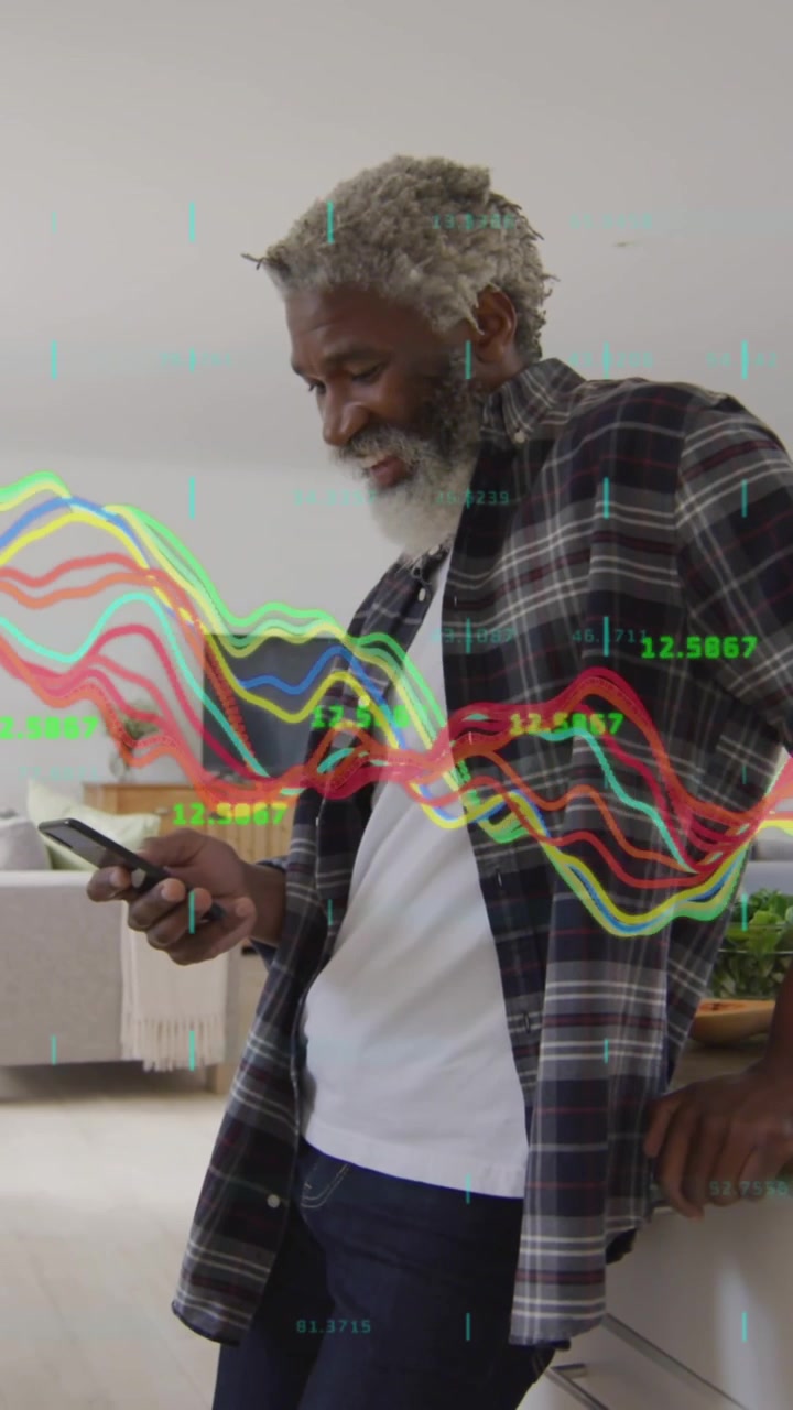 Animation of data processing over african american businessman using smartphone