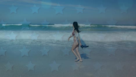 animation of american flag waving over woman running on beach by seaside on summer holiday