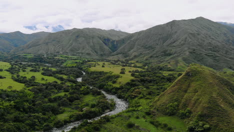 aerial view of river in the middle of the mountains - colombia