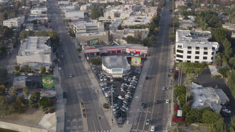 4k aerial shot over the intersection point of lankershim and cahuenga boulevards near universal city in the san fernando valley