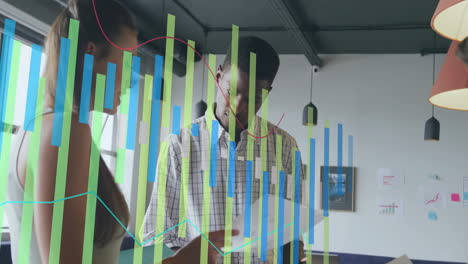 reviewing documents, business colleagues analyzing data visualization overlay in office setting