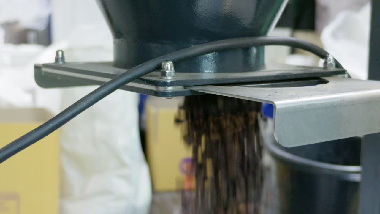 Discover the art of grinding coffee beans in a rustic savoring rich aromas and flavors.