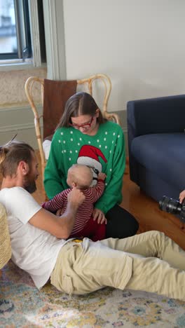 happy family with baby at christmas