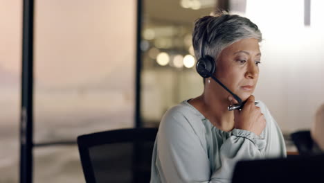 Senior-call-center-employee,-woman-and-phone-call