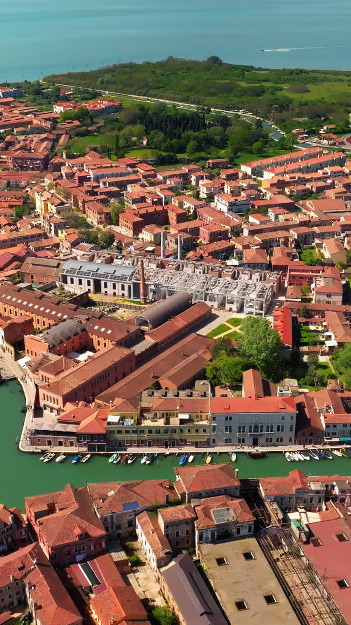 Aerial drone view of Venice City, Italy in daytime. Vertical