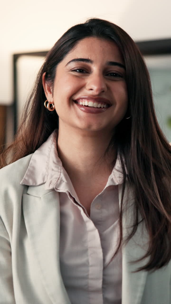 Professional woman smiling in business attire | Premium Stock Video Footage