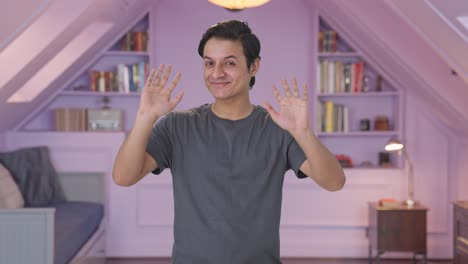 Happy-Indian-man-saying-hello