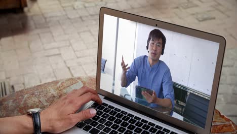 man having a video conference