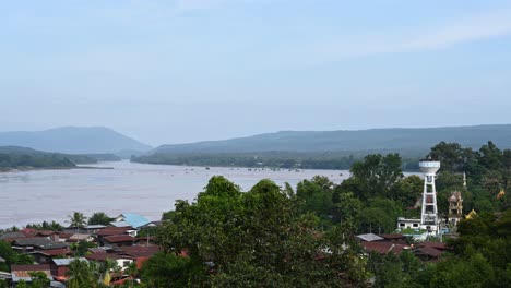 Two-Colour-River,-Ubon-Ratchathani,-4K-time-lapse-of-Mekong-River-and-Mun-River,-the-right-season,-the-rivers-flow-brown-and-blue-colours-of-water-making-them-a-tourist-attraction