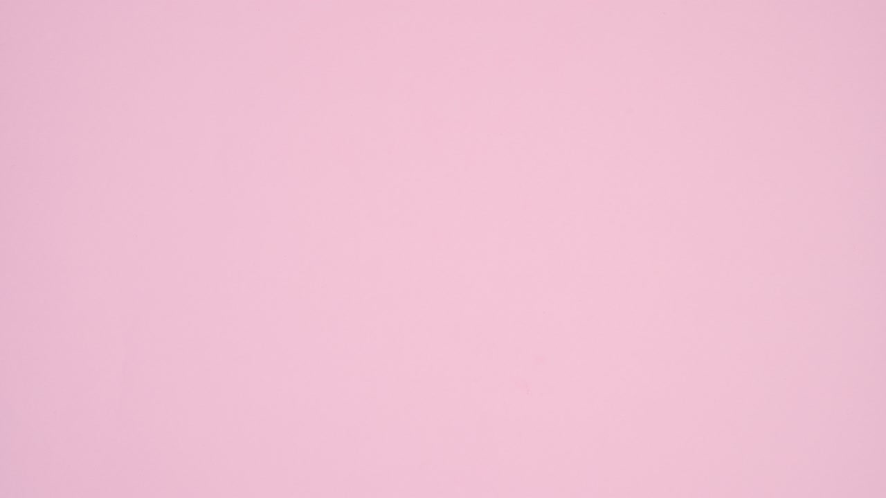Blowing red Valentine's day heart balloon. Stop motion flat lay