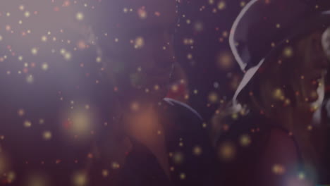 three friends dancing in dark party business event, showcasing floating golden bokeh sparkles