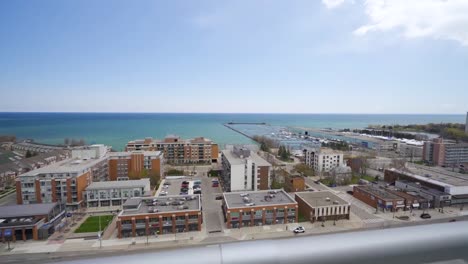view from the balcony of a mississauga apartment looking out over lake ontario