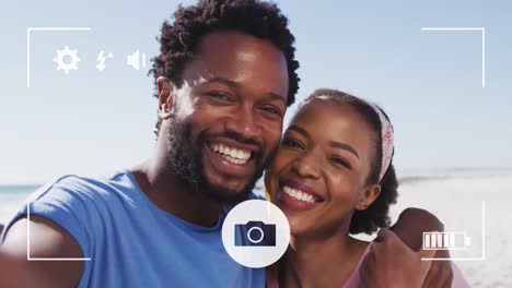 Animation-of-dots-over-happy-african-american-taking-selfie-on-beach