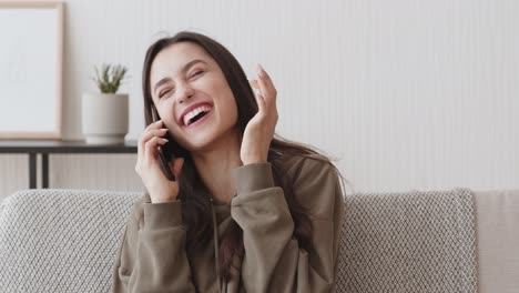 woman laughing on phone call