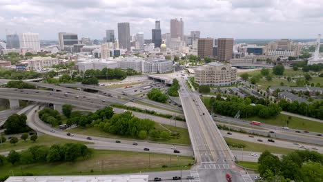 atlanta, georgia skyline and freeway traffic with drone video wide shot stable