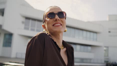 stylish woman in brown shirt