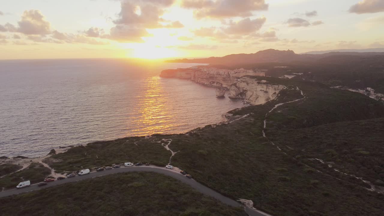 Aerial View of Stunning Sunset Over Coastal Cliffs