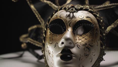 close-up of a spinning masquerade mask