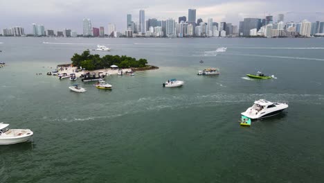 tourists on boats enjoying summer in vacation city of miami, florida - aerial