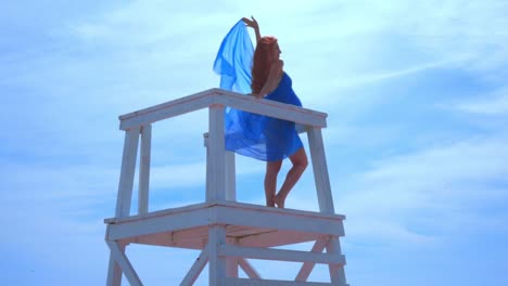 romantic woman on watchtower. sea vacation. romantic concept