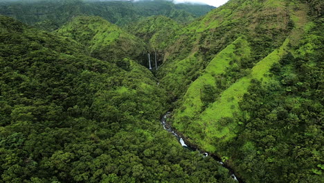 green valley with waterfalls