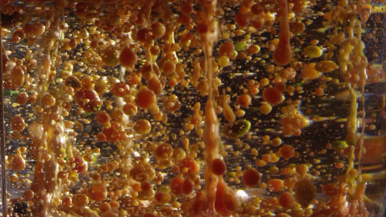 어나오는 거품, 거친 갈색과 오렌지색 액체 구, 텍스처 배경