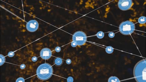 Animation-of-network-of-connections-with-icons-over-tree-branches-with-leaves