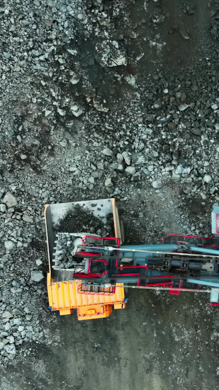 Mining operation with excavator loading a truck