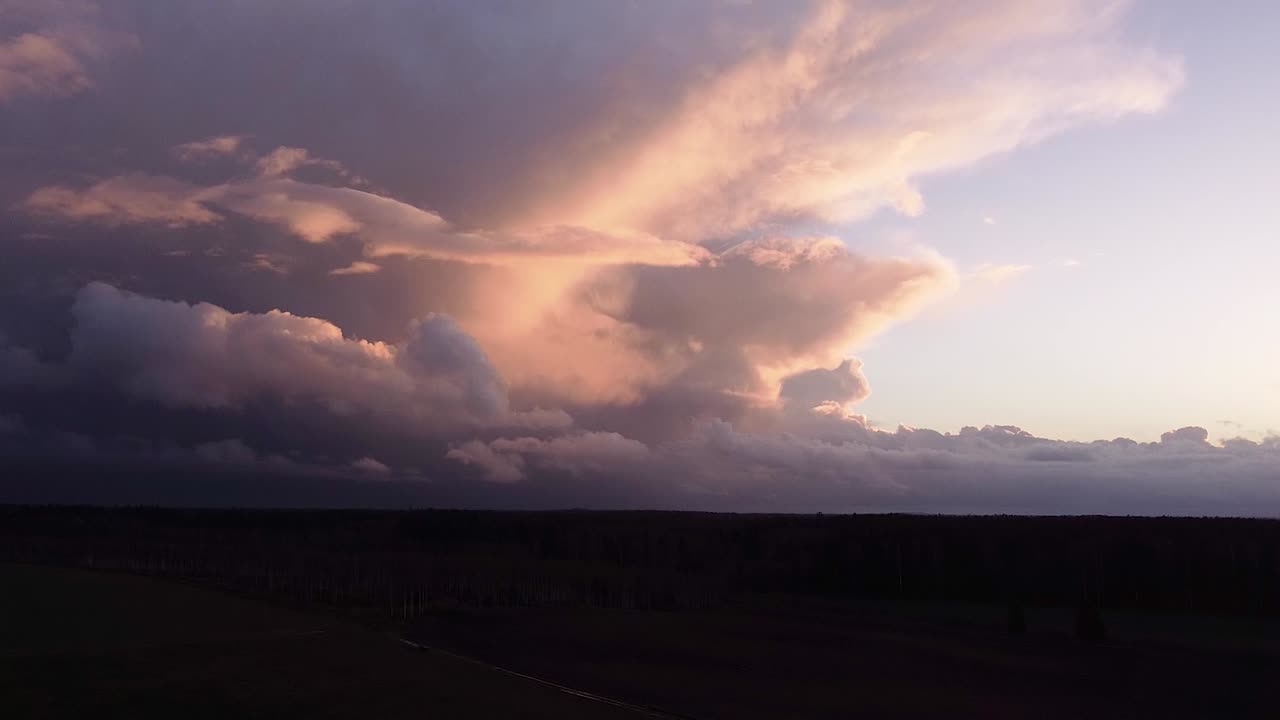 Autumn storm cloud mammatus time lapse from drone sunset light sky