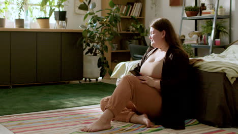 young woman sitting on the floor