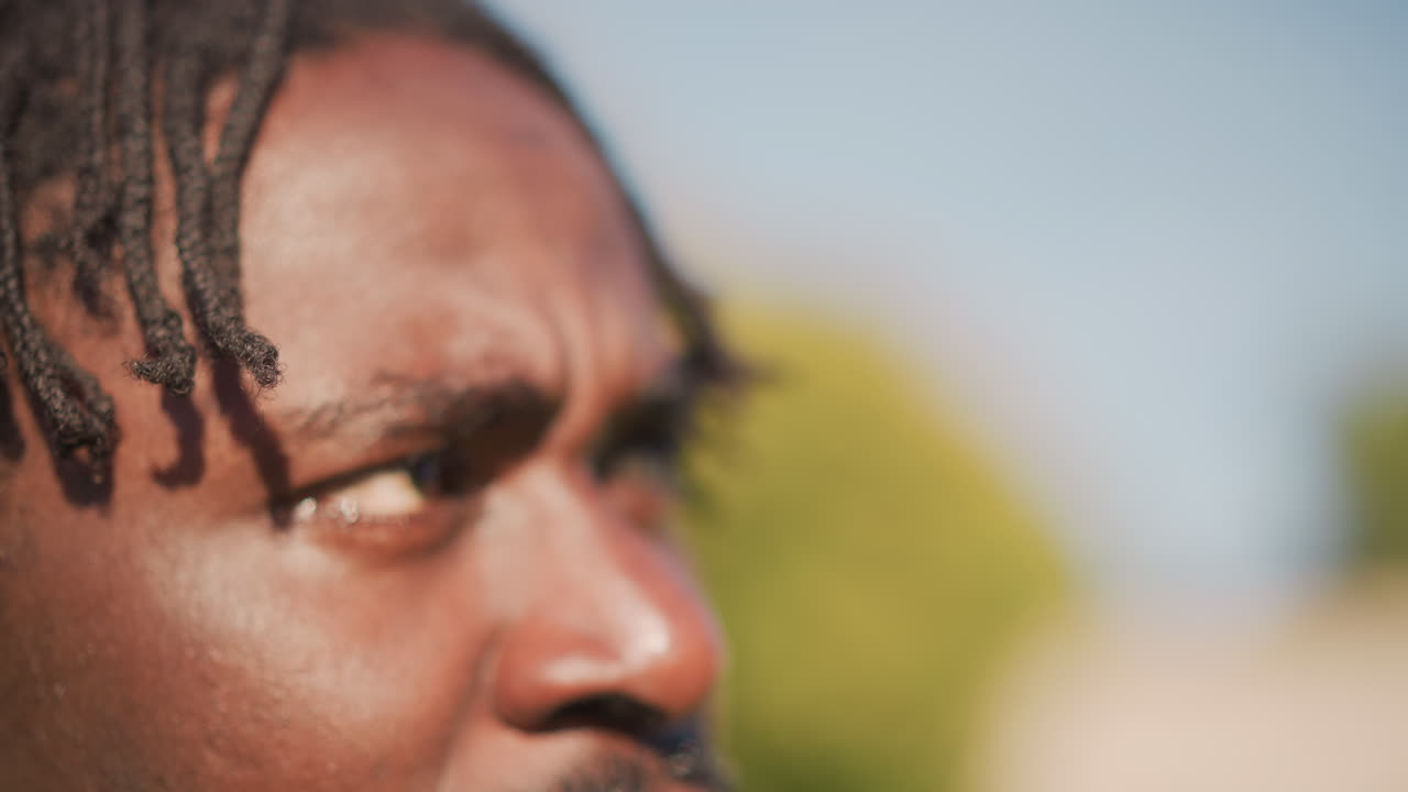 Focused Security Personnel Inspecting Surroundings With Alertness And Preparedness, An Attentive Security Officer Carefully Scanning Border With Intense Concentration And Readiness