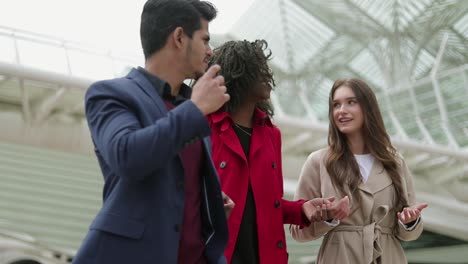 young people walking along street, talking, sharing emotions