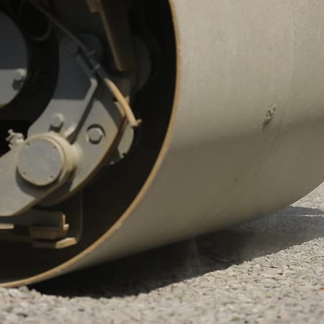 road roller working on a gravel