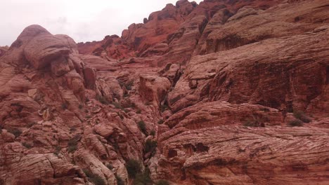 Gimbal-tilting-up-shot-of-a-rock-climbing-route-in-Red-Rock-Canyon,-Nevada